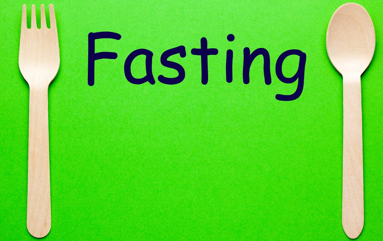 Fasting word with spoon and fork