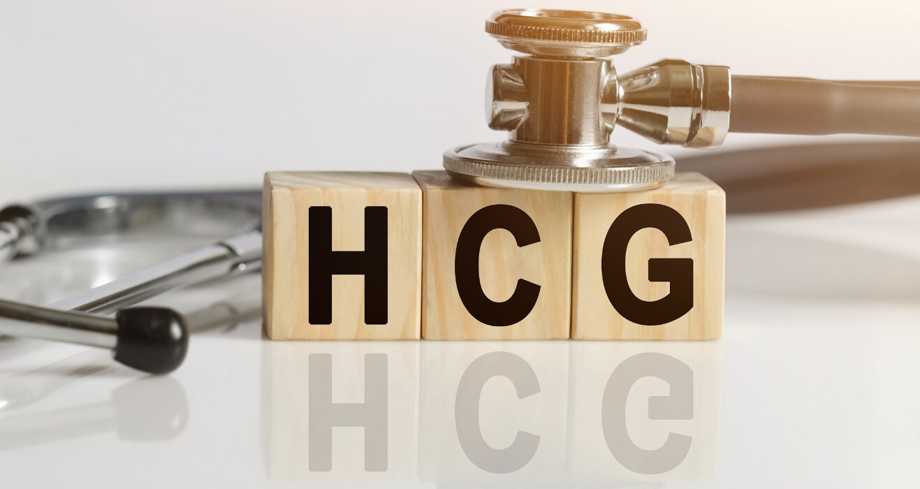HCG the word on wooden cubes