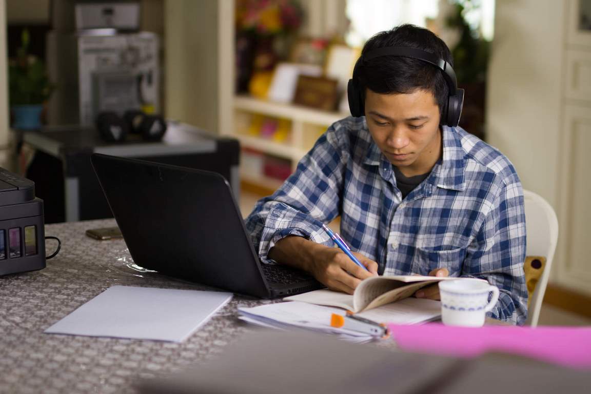 Man student study online class at home.